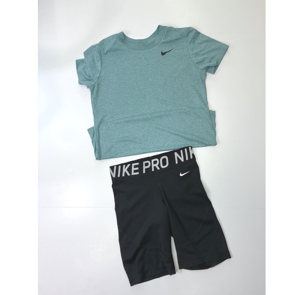 Sold.  Nike Bundle Womens Dri-FIT Teal T-Shirt and Nike Pro Black Biker